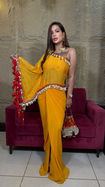 Designer mustard yellow party wear saree with embellished cape, ideal for Mehendi, Sangeet, festive, and wedding occasions.